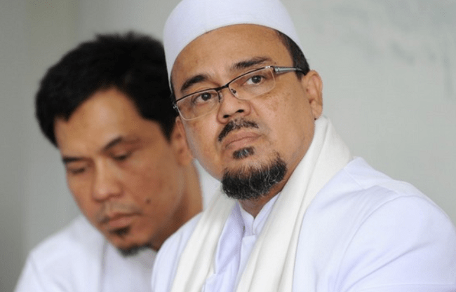 TIKTAK.ID - Tanggapi 3 Syarat Habib Rizieq Bisa Pulang Cepat, Munarman: Ini Bukti Negara Memang Otoriter dan Zalim
